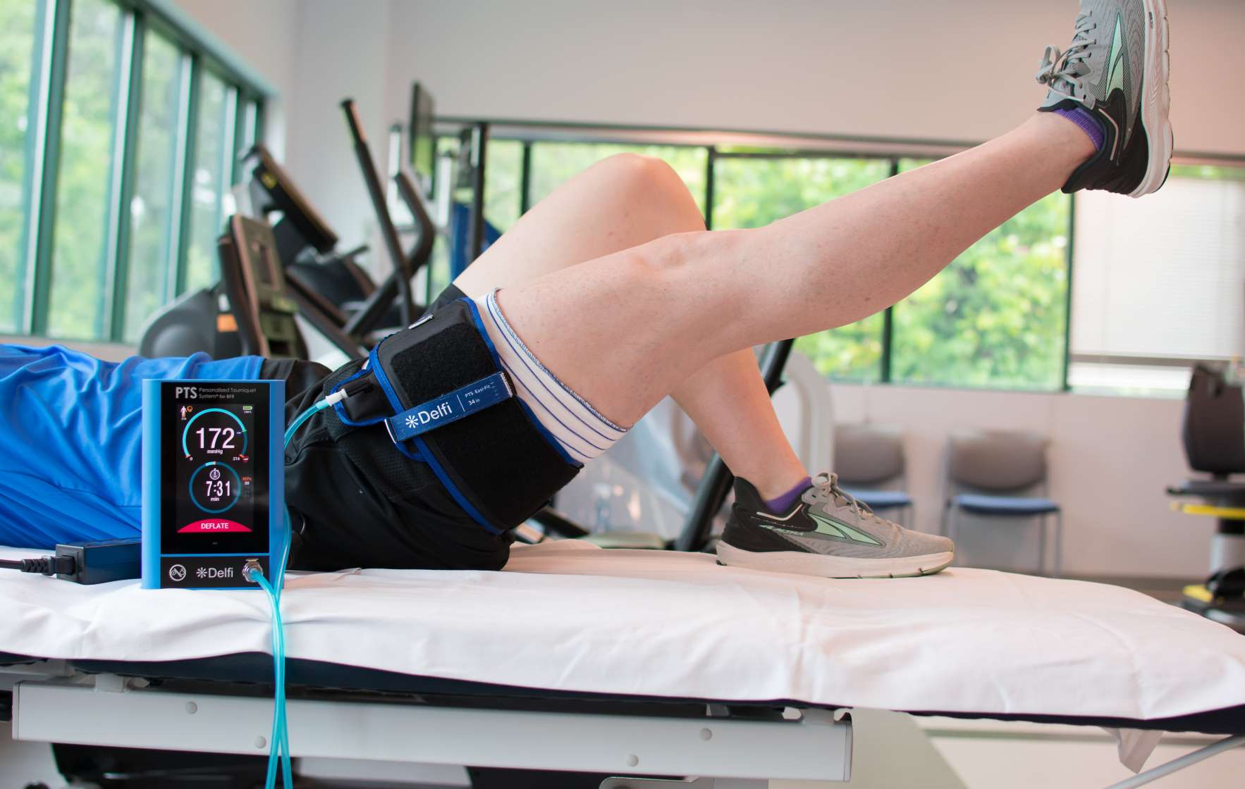 Man lifting leg to exercise.